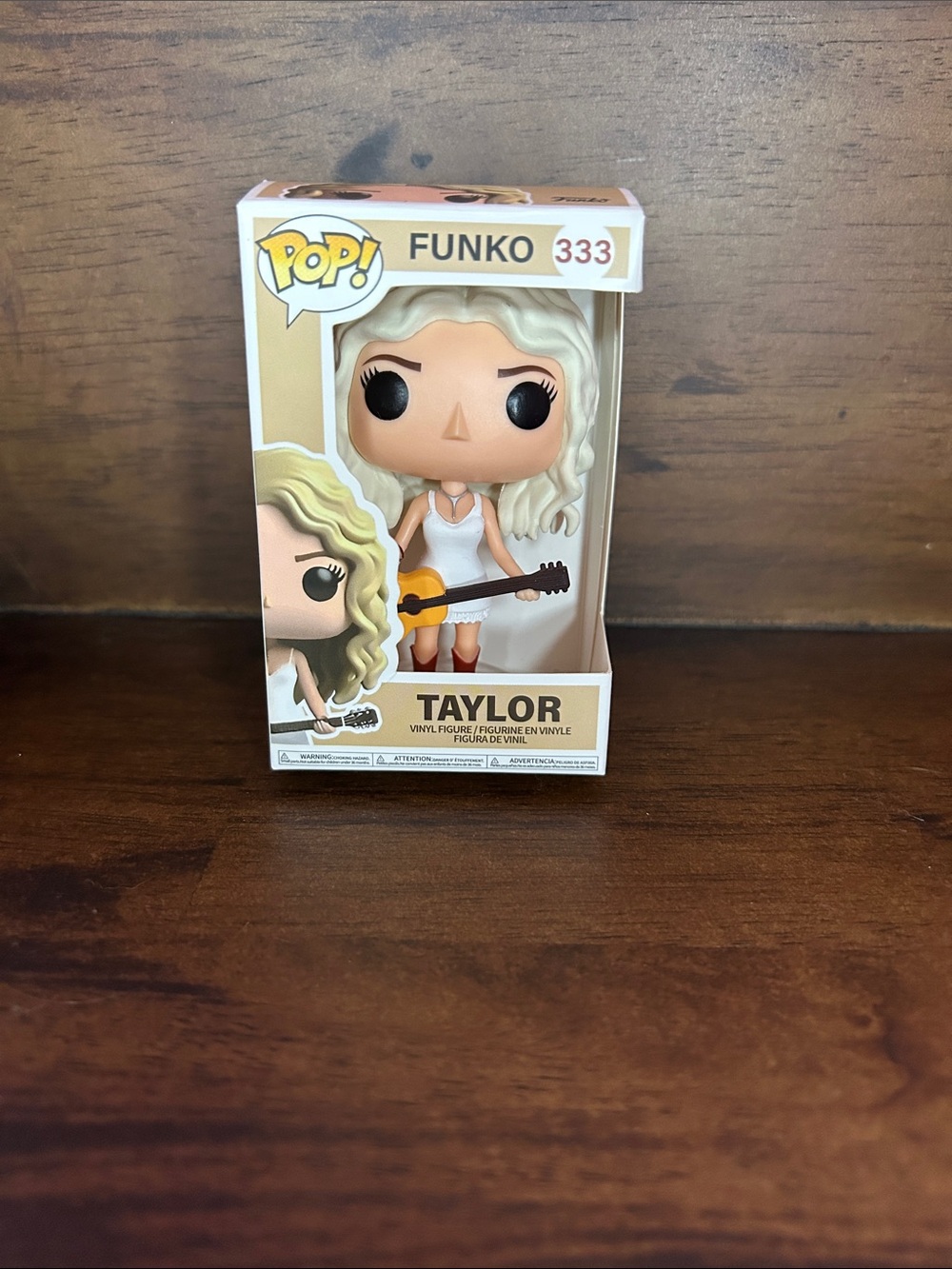 Funko Blonde-Haired Taylor with White Outfit and Guitar